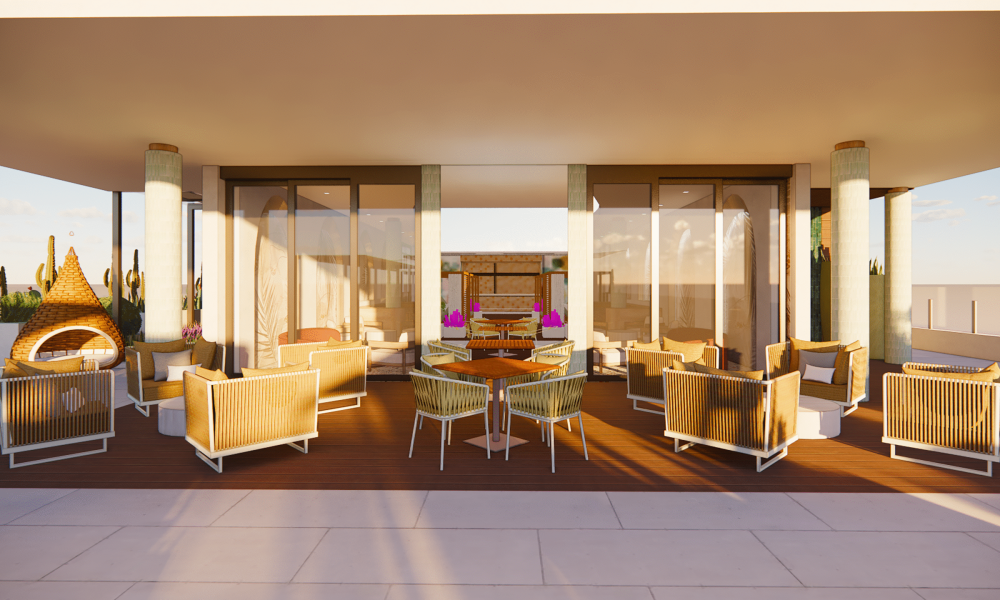 Modern outdoor lounge with wicker chairs, sofas, and tables arranged under a covered patio. Large glass doors, potted cacti, and warm lighting create a relaxed, inviting atmosphere.